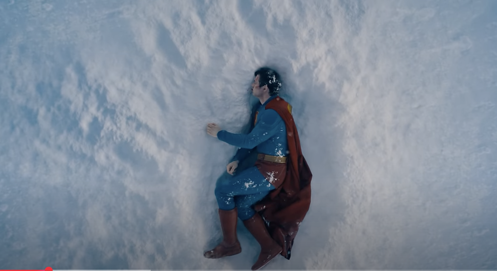 film still from Superman, showing Superman lying in the snow