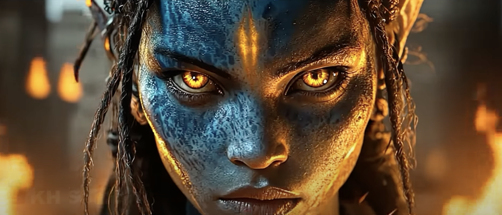 film still showing a character from Avatar staring at the camera with golden eyes